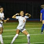 Malieta Redmond celebrates her goal against Auburn Mountainview. Photos by Ben Ray / The Mirror