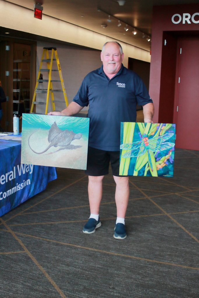 Federal Way artist Jimmy Chuck drops off his nature-inspired acrylic paintings for Arts Alive at the Federal Way Performing Arts and Event Center. Photos by Keelin Everly-Lang / the Mirror