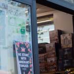 A friendly message on the door of a local grocer states we stand with immigrant families. Photo by Keelin Everly-Lang / the Mirror