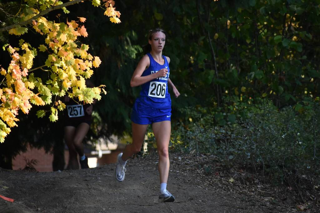 Abigail Collier is all alone in first place during Federal Ways race at Celebration Park. Ben Ray/The Mirror