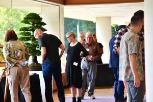 Guests enjoy viewing bonsai at the Pacific Bonsai Museum fundraiser Branch Out on Sept. 28. The event was held at the former headquarters building of the Weyerhaeuser Corporation. Photo by Bruce Honda