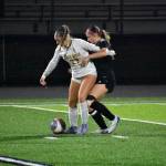 Ava Bowers held off the ball by Jordyn Daigle of White River. Ben Ray / The Mirror
