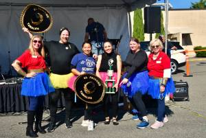 El Paisano Tamales celebrates winning first place from the judges at Taste of Federal Way 2025. Photo by Bruce Honda