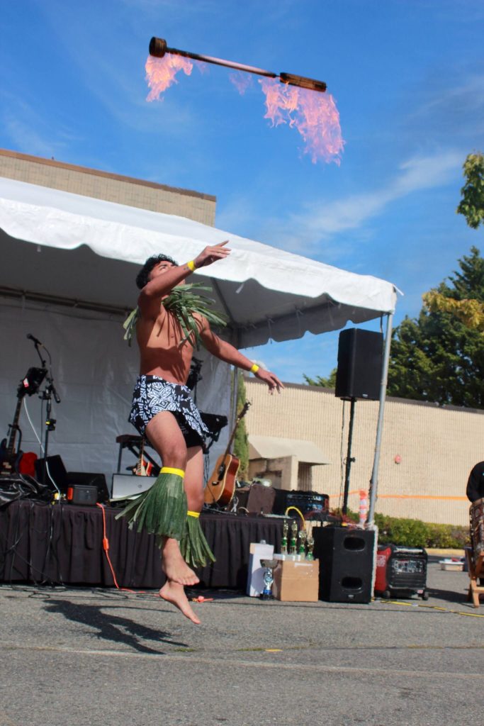 Siaki Failautusi of Toa Malosi performs at the Taste of Federal Way. Siaki Failautusi and Toaoaiga McConville make up the performance duo who won Federal Ways Got Talent this year. The 14- and 15-year-old were accompanied by the drumming duo Tui Fea. Photo by Keelin Everly-Lang / the Mirror