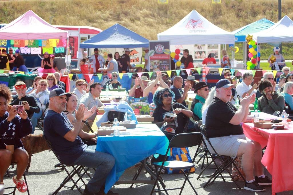 The audience applauds performances while enjoying their food at the Taste of Federal Way 2025. Photo by Keelin Everly-Lang / the Mirror