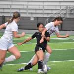 Kaihea Tuifua fights through contact against Enumclaw. Ben Ray / The Mirror