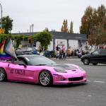 While many drivers shared their opinions about the No Kings protest in Federal Way through either supportive honks or through unsupportive middle fingers while passing by Saturdays protest, this driver made their message known by waving the progressive LGBTQ+ flag out the window and emblazoning NO KINGS on the side of their hot pink vehicle. Photo by Rachel Jones