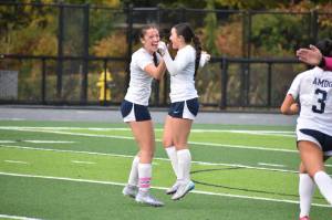 Grace Lepkowski (left) celebrates her go-ahead goal. Ben Ray / The Mirror