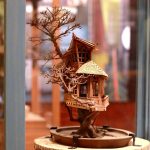 A miniature treehouse is integrated with a deceased bonsai tree in exhibit Building Wonder: Bonsai Treehouse honoring the creative legacy of Dave Creek, a lead character designer for Bobs Burgers. Six tiny treehouses are featured in the exhibit that runs through Dec. 21, 2025. Photos by Keelin Everly-Lang / the Mirror