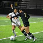 Jordynn Koria defends Kaihea Tuifua in the district tournament. Ben Ray / The Mirror