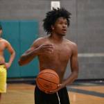 De Tre Walker holds the ball in his hand during Todd Beamer practice. Ben Ray / The Mirror