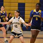 Avaieya Sinclair plays defense during a drill at Decatur practice. Ben Ray / The Mirror