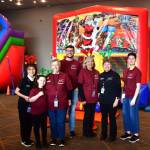 The staff of the Federal Way Performing Arts and Event Center hosted a well-attended Holiday Festival on Nov. 29 which featured face painting, Santa Photos, inflatable bounce houses, games, crafts, cocoa, a free movie and more. Photos by Bruce Honda.