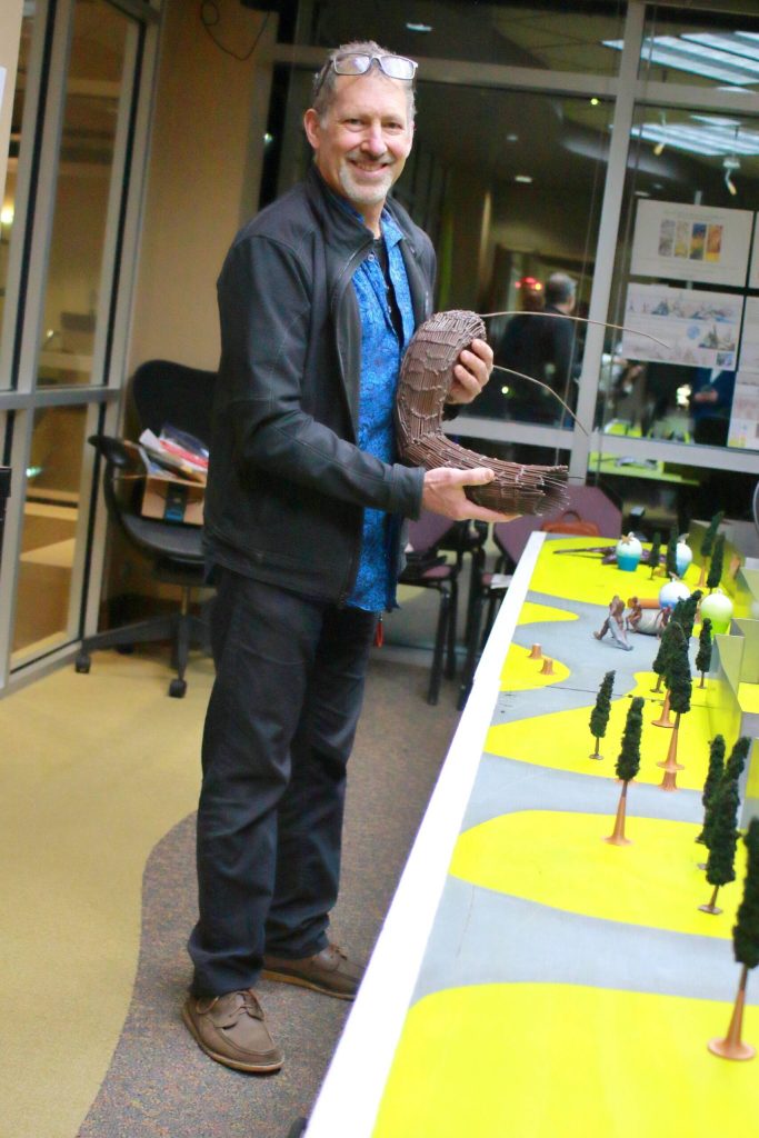 Artist Steve Nagode shows off an example of how the metal Sasquatch sculptures will be crafted, standing next to a diorama of his art proposal for Federal Way. Photo by Keelin Everly-Lang / the Mirror