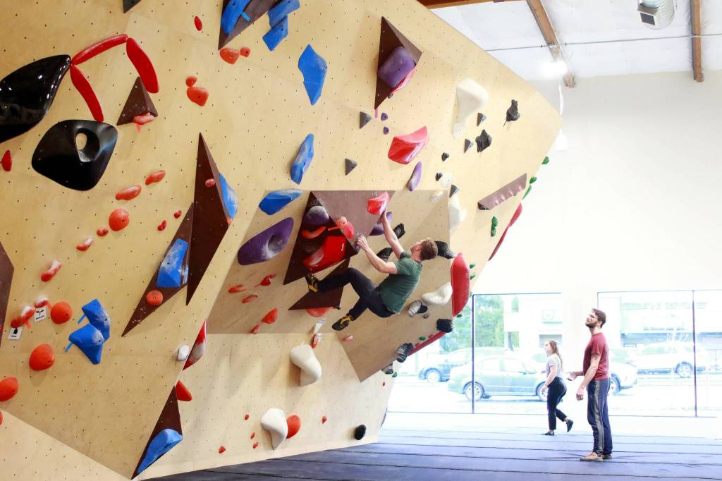 Climb NORA members test out the walls in the newly opened climbing gym in Federal Way. Photo by Keelin Everly-Lang / the Mirror