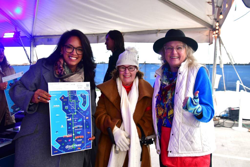 Representative Kristine Reeves (D-District 30), Federal Way City Councilmember Susan Honda and Greater Federal Way Chamber of Commerce CEO Rebecca Martin at the light rail grand opening. Photo by Bruce Honda.