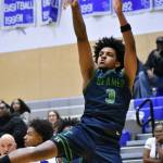 Doni Burkett takes a fade-away jump shot against Federal Way. Ben Ray / The Mirror