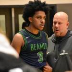 Doni Burkett and Todd Beamer head coach Brent Brilhante talk at the end of the game. Ben Ray / The Mirror
