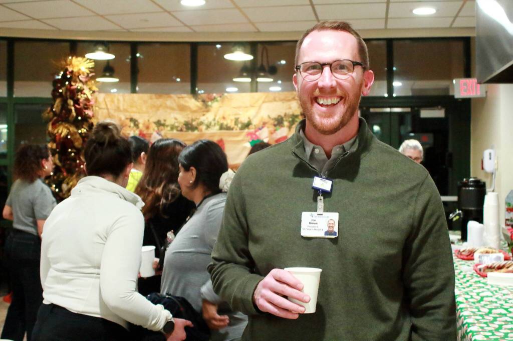 Hospital director Joe Brown enjoys the festivities at their Santa and Mrs. Claus holiday event. Photo by Keelin Everly-Lang / the Mirror