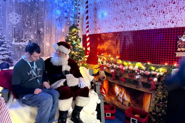 At We Rock the Spectrum gym in Federal Way, owner Colin Hirsch puts on a variety of inclusive and accessible events, like this visit with Sensory Santa, where attendees can access this classic holiday experience without having to navigate the challenges a mall visit might bring. Courtesy photo