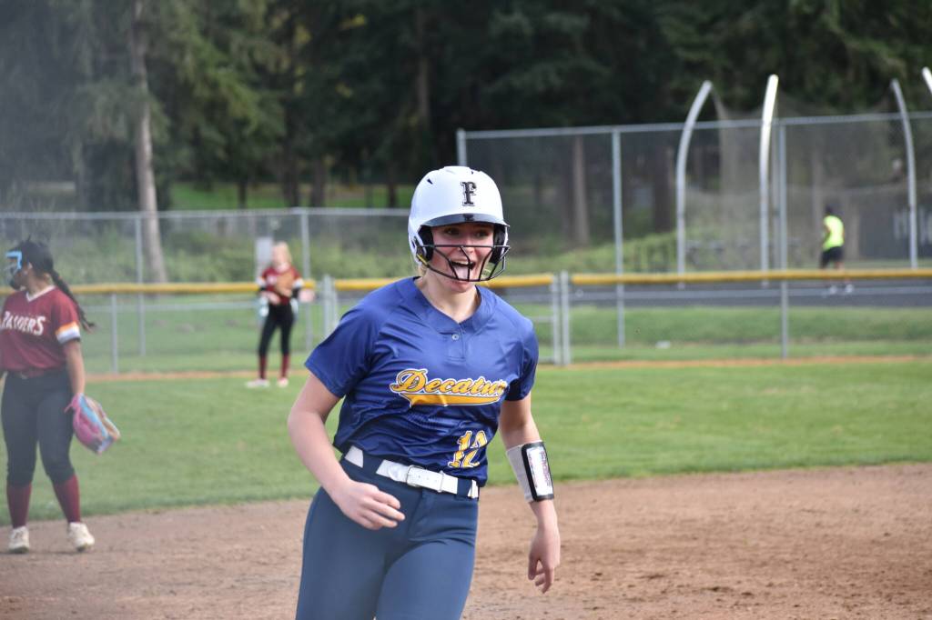 Decaturs Audrey Deviney celebrates her home run against Thomas Jefferson. Ben Ray / The Mirror