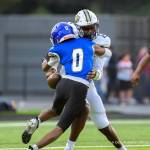 Dee Torres / Mi Lente photography
Federal Ways Jay Sinclair sacks Antoine Williams of Decatur in the first quarter.