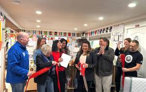 The city of Federal Way celebrated the opening of three new home-based child care businesses including Mundo de Jugetes, with owner Nidia Hernandez shown here at the ribbon cutting on Dec. 30, 2025. The entrepreneurs were invested in by local program Imagine U and the City of Federal Way. Courtesy photo.