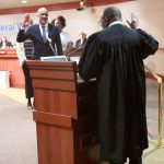 Les Sessoms is sworn in as a new member of the Federal Way City Council on Jan. 6 by Judge LeRoy McCullough of King County Superior Court. Photos by Keelin Everly-Lang / the Mirror