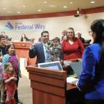 Martin Moore is sworn in as a new member of the Federal Way City Council on Jan. 6 by State Rep. Kristine Reeves (D-District 30). Photo by Keelin Everly-Lang / the Mirror