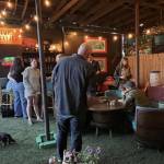 Guests enjoy the tiki bar area at Camp Moxy Jos in 2025. Photo by Anita Nowacka.