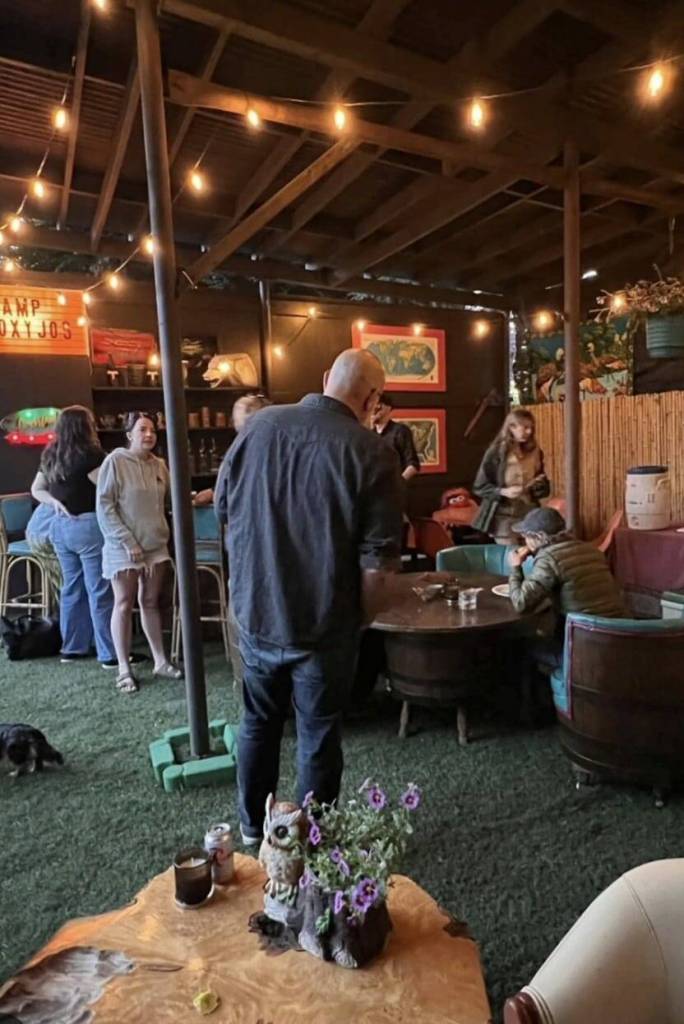 Guests enjoy the tiki bar area at Camp Moxy Jos in 2025. Photo by Anita Nowacka.