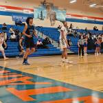 Daesean Toomer goes for a rebound against Auburn Mountainview. Ben Ray / The Mirror