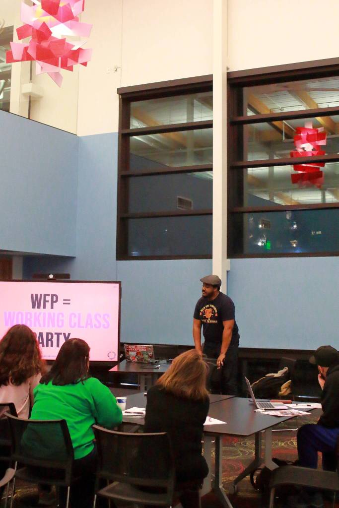 Clifford Cawthon of the Working Families Party leads a group discussion on community priorities and visions for the future of South King County.