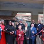 Staff of ULMS, local officials and community members and Booker family members join to cut the ribbon for the official opening of the Booker House in Federal Way. Photo by Keelin Everly-Lang / the Mirror