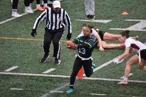 Darlene Kuedituka reaches the ball into the end zone to score for the Titans. Ben Ray / The Mirror