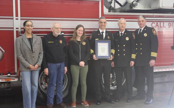 Left to right: South King Fire Commissioners Martese Monroe, Bill Fuller and Caroline Vadino, and South King Fire Chief Ryan Woodey, Assistant Chief of Operations Dave Michaels, and Assistant Chief of Planning and Services Eric Suckoll at Woodeys meet and greet on Feb. 10 at Station 62. Photo by Joshua Solorzano/The Mirror