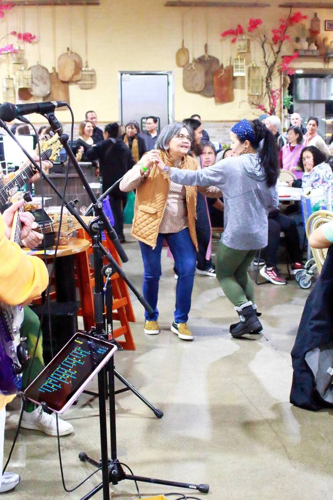 Dancing might not be the first activity expected to take place in a grocery store but on Saturday, Feb. 28, Island Pacific Markets live music and festivities got people moving. Photo by Keelin Everly-Lang / the Mirror