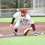Thomas Jefferson first baseman warms up before the Raider scrimmage. Ben Ray / The Reporter