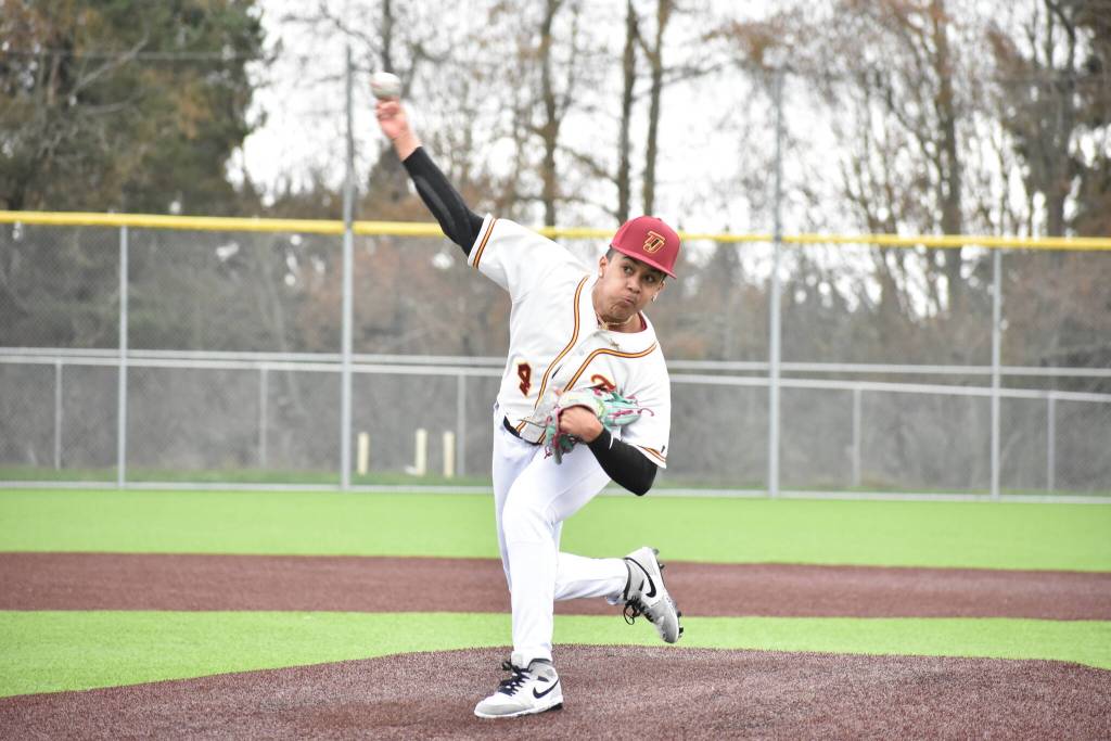 Thomas Jefferson starting pitcher warms up before scrimmage. Ben Ray / The Reporter