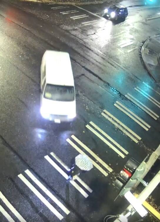 Photo from SafeCity footage
A child crosses the street right before being hit by the white van on Oct. 27, 2025, at the intersection of 19th Avenue SW and SW Campus Drive.