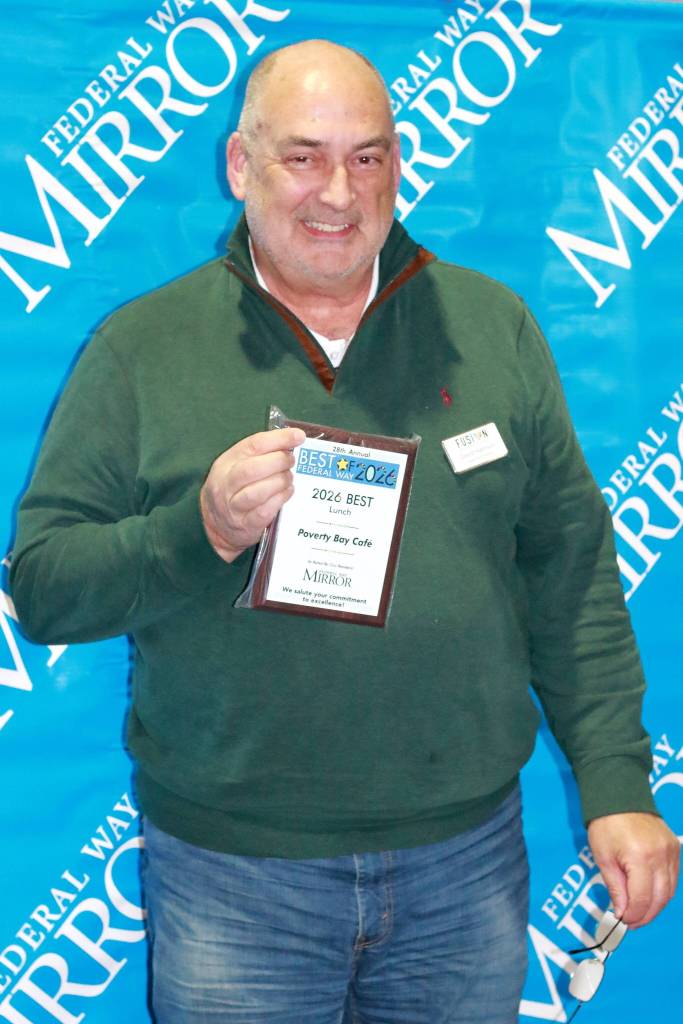 Photo by Keelin Everly-Lang / the Mirror
David Harrison accepts awards for FUSION and Poverty Bay Cafe.