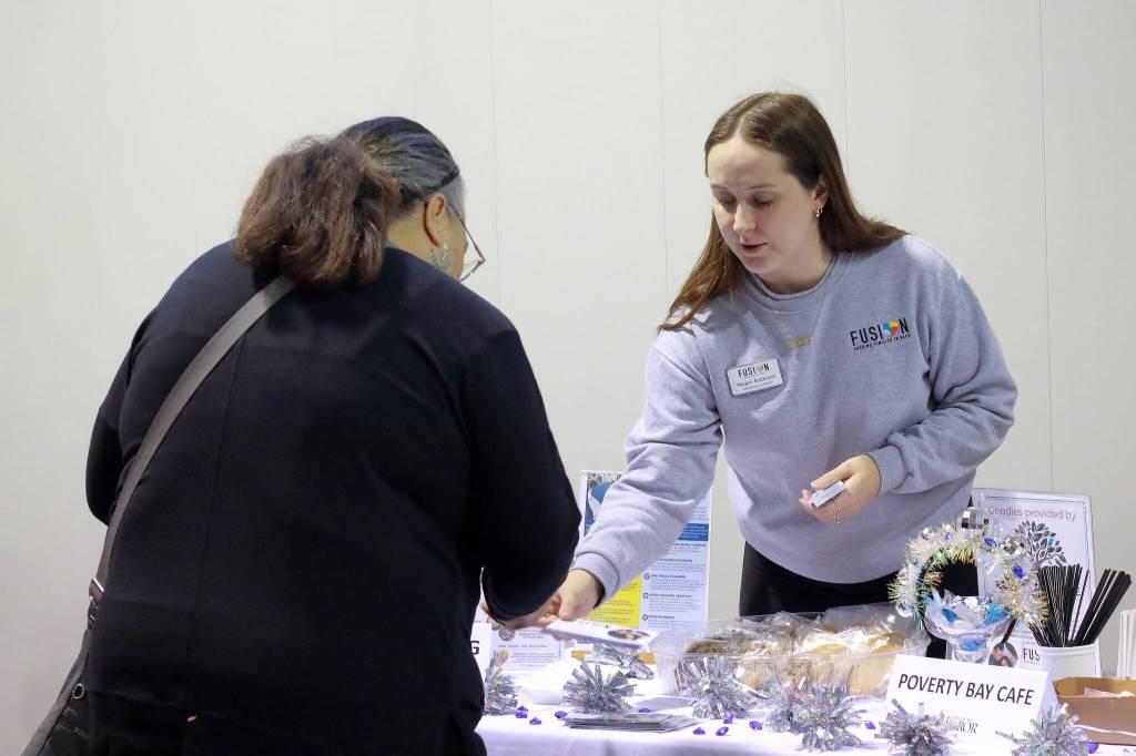 Photo by Keelin Everly-Lang / the Mirror
Megan Anderson of FUSION connects with community members.