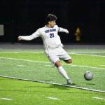 Ilyaz Veysalov clears the ball for Todd Beamer. Ben Ray / The Mirror