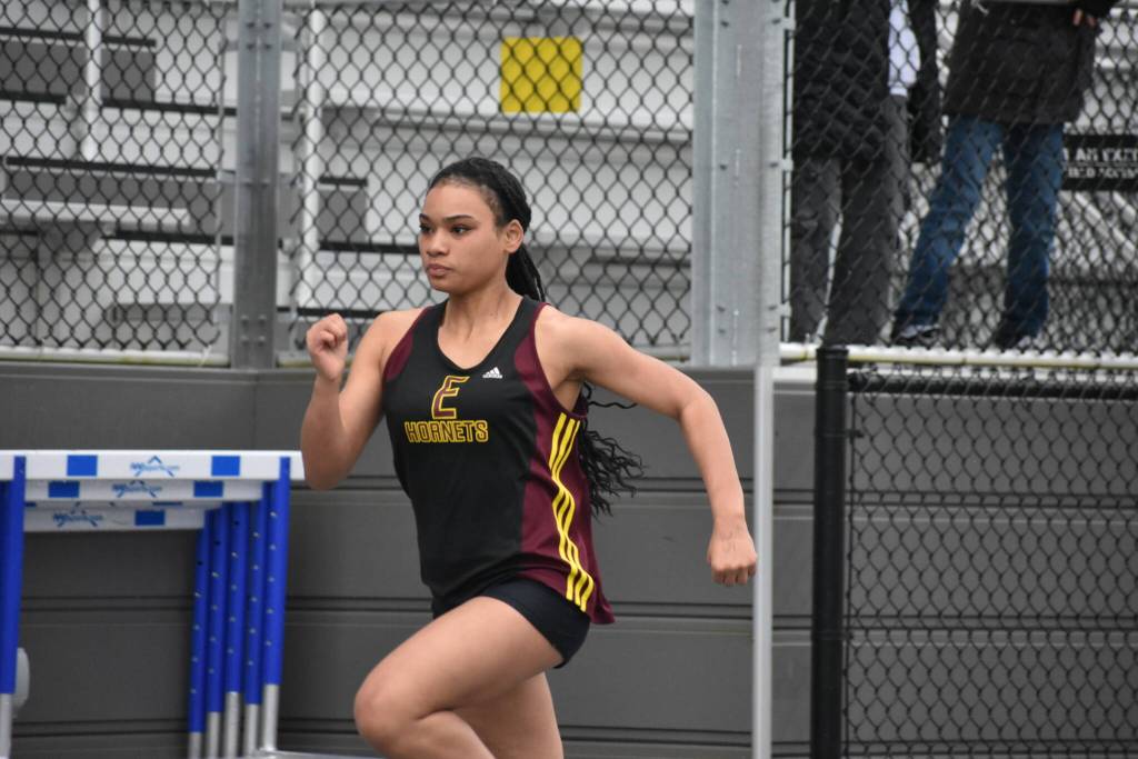 Enumclaw sprinter runs down the final straight at Federal Way Memorial. Ben Ray / The Mirror