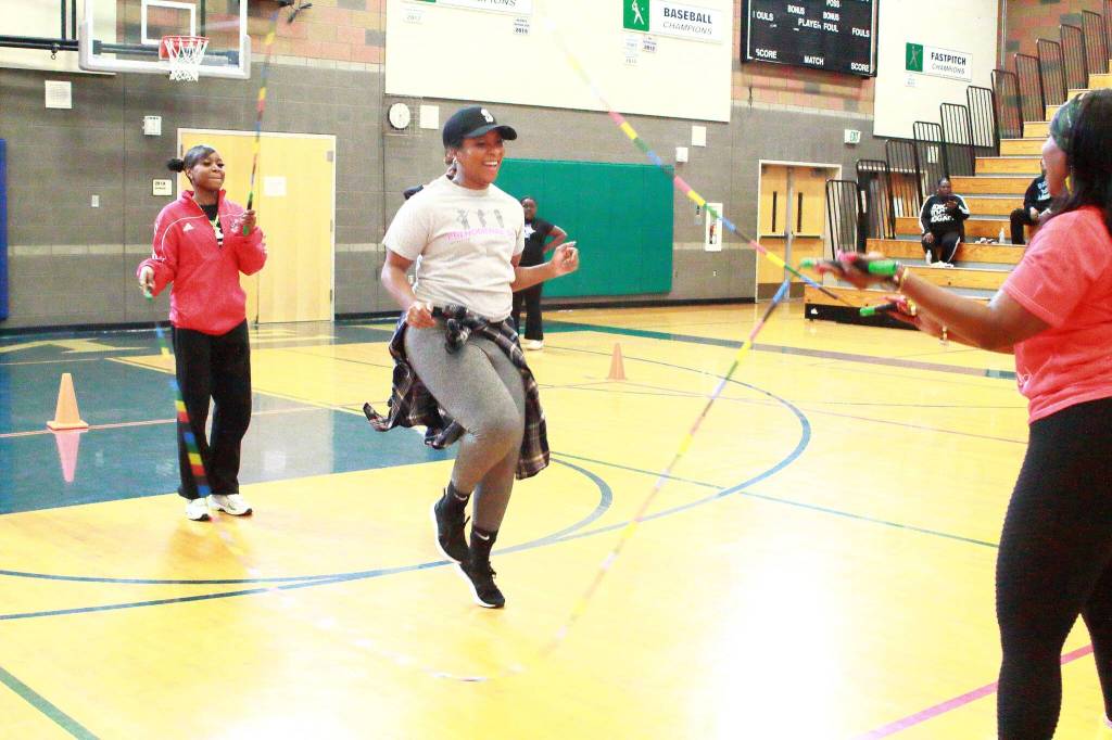 Community leader Icea Pettigrew jumps rope with the Double-Dutch Divas.