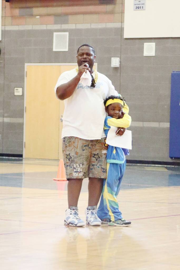Executive Director of Progress Pushers Eddie Purpose and his son at the 80s Dodgeball FUN-raising event. Photo by Keelin Everly-Lang / the Mirror