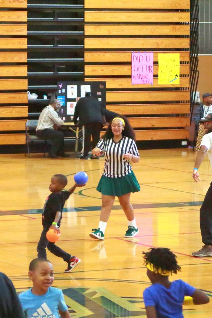 Community of all ages plays dodgeball together as community members connect with local mental health service providers on the edges of the gym. Photo by Keelin Everly-Lang / the Mirror