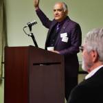 Photos by Bruce Honda
Rotary member Rajiv Nagaich speaks at the Join or Die screening on April 2 in Federal Way.
