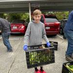 Volunteer and Martha Collins grandson. Photo courtesy of Martha Collins
