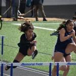Decatur and Todd Beamer hurdlers leap over the hurdles. Ben Ray / The Mirror